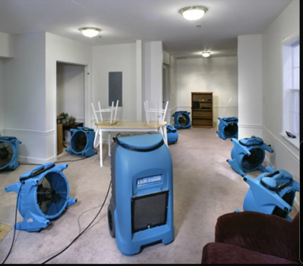 Air movers and dehumidifier setup for Water Extraction & Removal in Monessen
